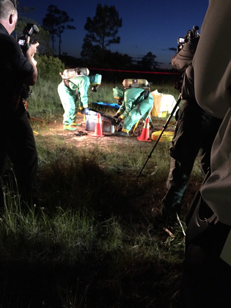 Martin County fire working in Hazmat suits to recover the remains of Tricia Todd
